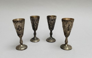 Set of 4 small Kiddush glasses in silver plated metal repoussé