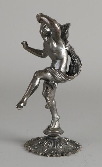 Silver figurine, 835/000, in the form of a dancing figure with a draped cloth, standing on one foot. Equipped with a silver base with flower decoration. MT.:RFWigmans, Amsterdam, yl.:Q:2000. about 635 grams. 8x17cm. In very good condition