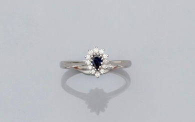 Small white gold ring, 750 MM, centered on a pear-cut sapphire surrounded by diamonds, size: 54, weight: 3.4gr. rough.