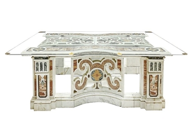 Table with assembled and committed polychrome marbles
