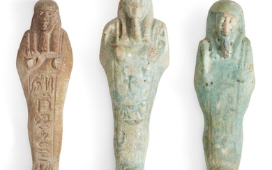 Three Egyptian glazed faience shabtis Late Dynastic Period, circa 664-332 B.C. Each of typical mummiform holding pick and hoe, with a frontal column of hieroglyphic text, 11cm-11.5cm high (3) Provenance: Property of a private collector, Edinburgh...