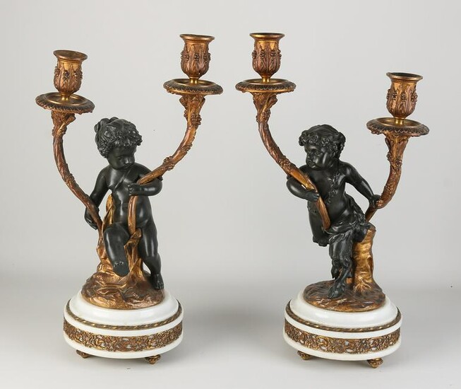 Two bronze/marble candlesticks, 1860
