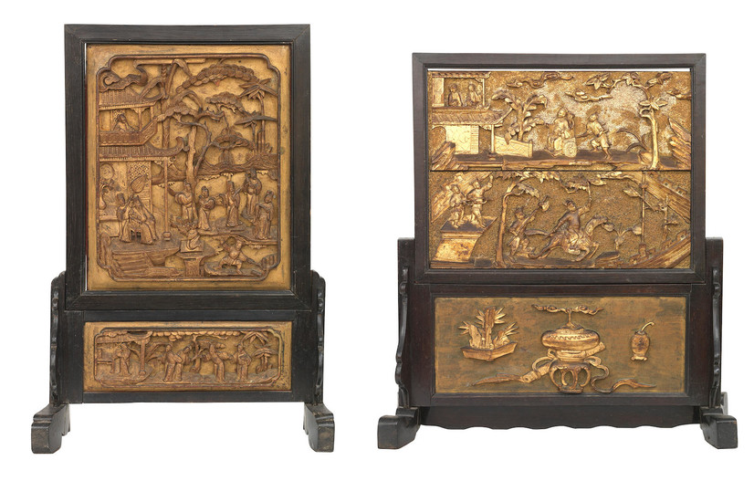 Two gilt-wood and lacquer table screens on stained-wood stands