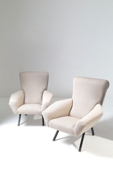 Two wooden beige armchairs. 1950s