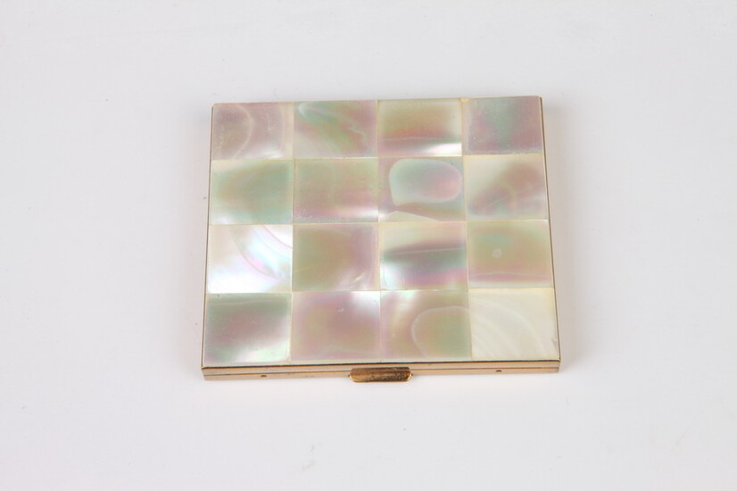 VINTAGE MOTHER OF PEARL AND GOLD-TONE COMPACT MIRROR. Estimate $20-40...