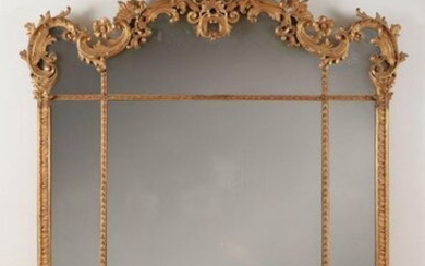 Venetian mirror in gilded and carved woodVenice, early 19th centuryrich molding with rocaille motifs, leaf gilding, mercury mirror 175 x 127 cm