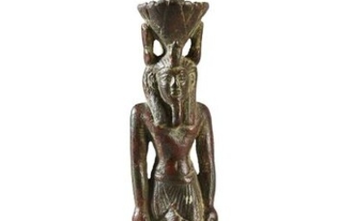 Votive statuette representing the god Neferetum on a rectangular base in the marching attitude and wearing a lotiform crown. Bronze.