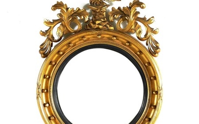 Regency style giltwood bull's eye mirror