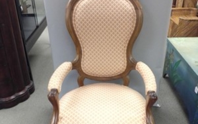 Rococo Revival Carved and Upholstered Walnut Armchair