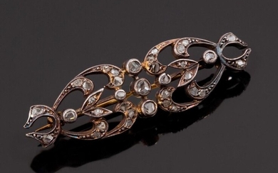 18k (750 thousandths) silver and yellow gold brooch from the...