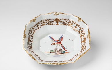 A large Meissen porcelain dish with a parrot and a Bolognese dog