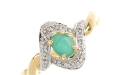 A 9ct gold emerald and diamond cluster ring. The