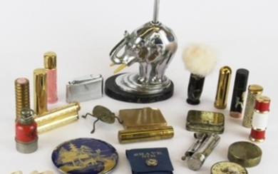 A box of interesting small items including a chromium plated elephant lighter, lighter H. 16cm.