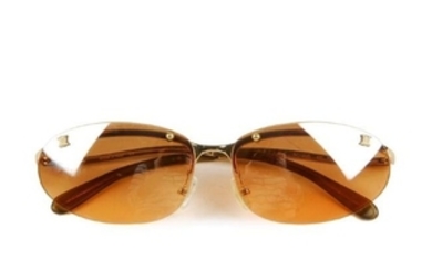 CÉLINE - a pair of rimless sunglasses. Designed with