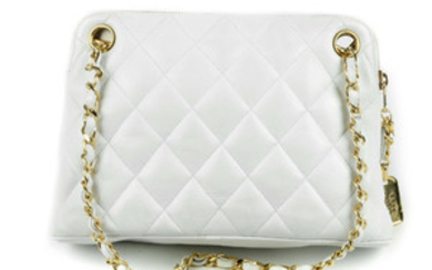 CHANEL - a white quilted leather vintage zip handbag. View more details
