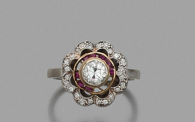 CIRCA 1920 DIAMOND RING A diamond, ruby, platinum and gold...