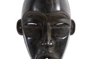 A DAN WOODEN MASK FROM IVORY COAST 32 cm high...