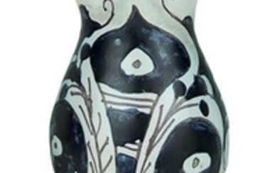 Jug Oval shaped jug, trefoil rim, ribbon handle, flat support...