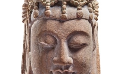 A LARGE CARVED LIMESTONE HEAD OF A BODHISATTVA SUI DYNASTY