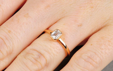 A rectangular-shape diamond single-stone ring. With