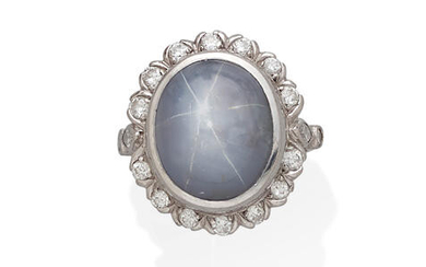 A star sapphire, diamond and platinum ring
