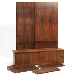 884/960: Finn Juhl: Brazilian rosewood wall unit comprising four wall panels, 15 shelves, a writing top and a sideboard. Manufactured by Bovirke.