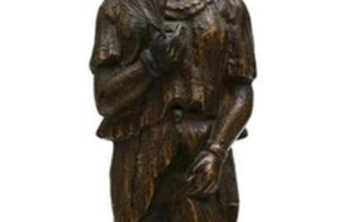 A 19TH CENTURY CAST IRON AND BRONZE TOBACCONIST FIGURE
