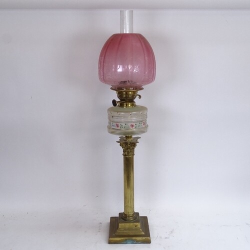 A 19th century brass Corinthian column duplex oil table lamp...