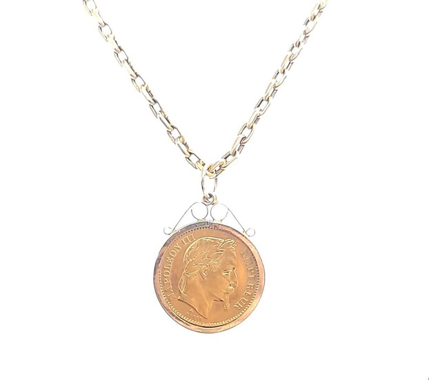 A 20 French Franc gold coin and chain