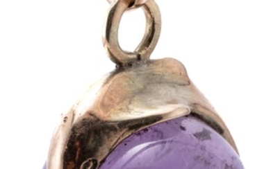 A 9CT GOLD DOLPHIN AMETHYST PENDANT; featuring a 17mm amethyst sphere, wrapped around with a gold dolphin, wt. 10g.