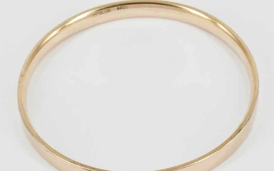 A 9ct ROSE GOLD LINED BANGLE