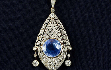 A Belle Époque platinum and 15ct gold, Sri Lankan sapphire, diamond and onyx pierced pendant, with later chain.