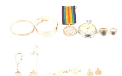 A British War Medal1914-1918, two silver bangles, ingot, pocket watch, coin bracelet.