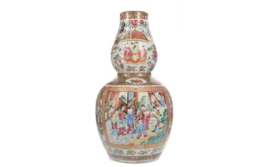 A CHINESE CANTON FAMILLE ROSE DOUBLE GOURD VASE