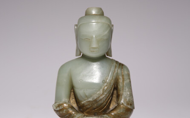 A CHINESE CELADON JADE FIGURE OF AMITABHA BUDDHA