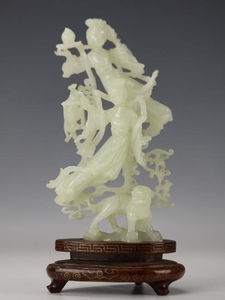 A Carved Hetian White Jade Figure of Fairy and Dog
