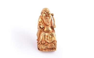 A Chinese gold 'Immortal' nail guard