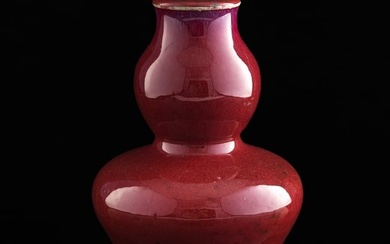 A Chinese jun red-glazed hulu-form vase, early 19th century