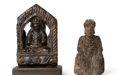 A Chinese wood carving of a seated Daoist deity, and a Himalayan...