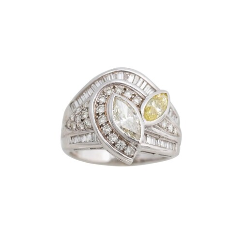 A DIAMOND CLUSTER RING, set with one fancy yellow marquise d...