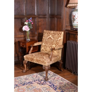 A George II walnut Gainsborough armchair