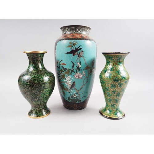 A Japanese cloisonne baluster vase, decorated panels with bi...