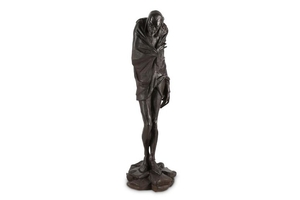 A LATE 19TH / EARLY 20TH CENTURY CAST IRON FIGURE OF