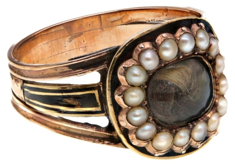 A Mourning Ring With central knot of woven hair surrounded by natural seed pearls all set again...