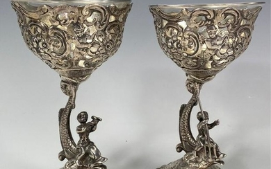 A PAIR OF CONTINENTAL SILVER FIGURAL SALTS