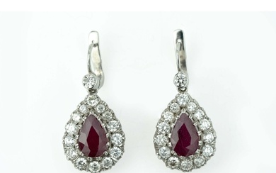 A Pair Of Ruby And Diamond Earrings A pair of diamond ear...