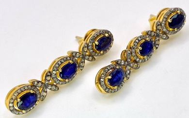 A Pair of Blue Sapphire and Diamond Drop Earrings....