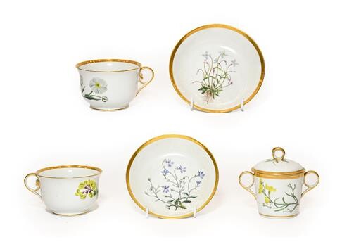 A Pair of Chamberlains Worcester Botanical Breakfast Cups and Saucers, circa 1800, decorated...