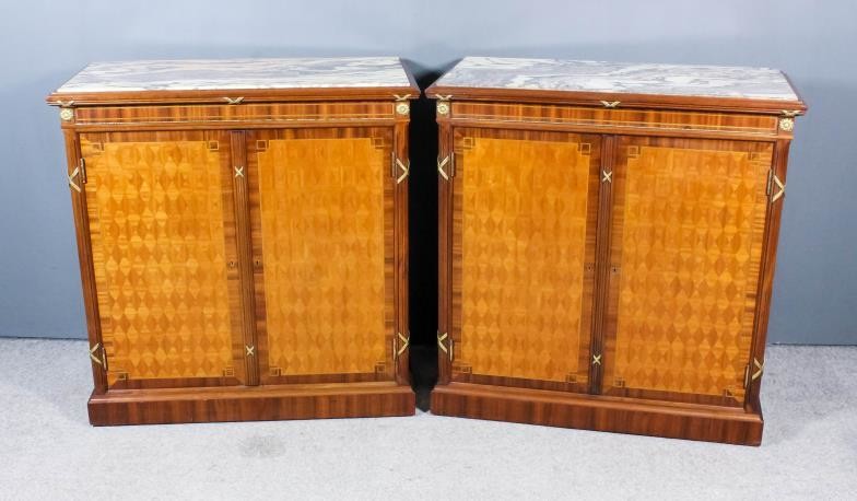 A Pair of French Mahogany, Parquetry, Gilt Metal Mounted...