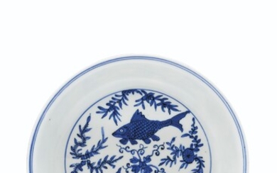 A RARE BLUE AND WHITE 'TWIN FISH' DISH, WANLI FOUR-CHARACTER MARK IN UNDERGLAZE BLUE AND OF THE PERIOD (1573-1619)